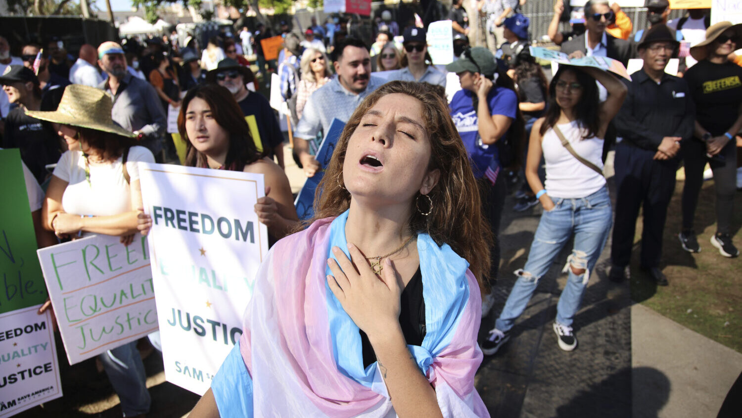 Supporters gather during an immigration rally on Saturday, Sept. 20, 2025, in Los Angeles....