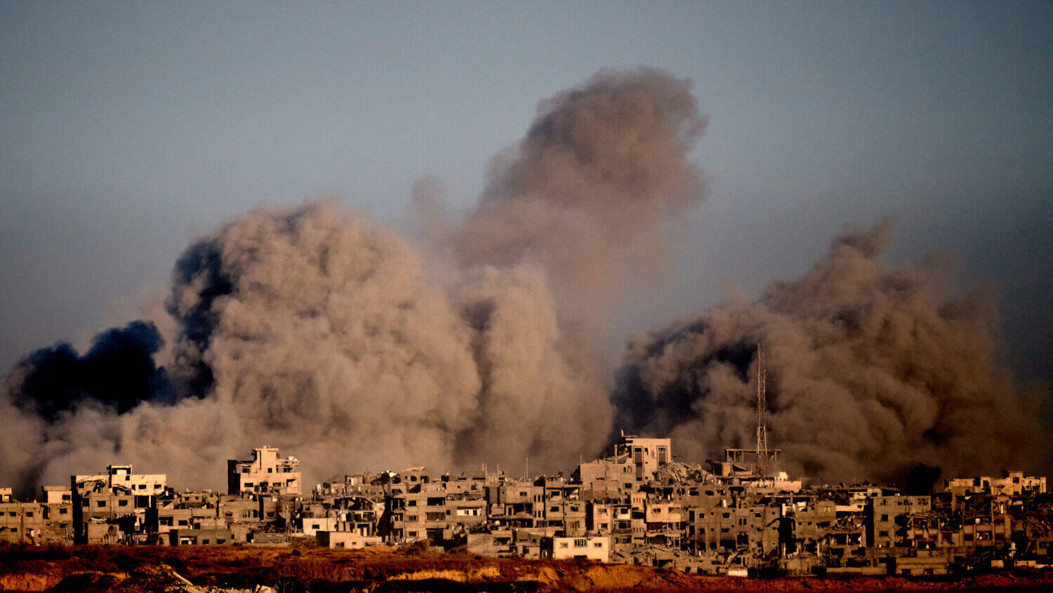 Smoke rises following an Israeli military strike in the northern Gaza Strip, seen from southern Isr...