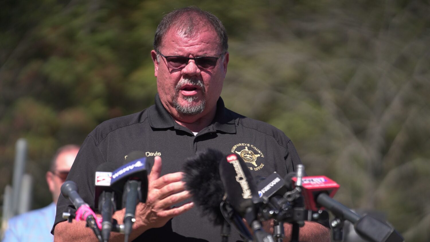 Humphreys County Sheriff Chris Davis, right, speaks during a news conference Monday, Oct. 13, 2025,...