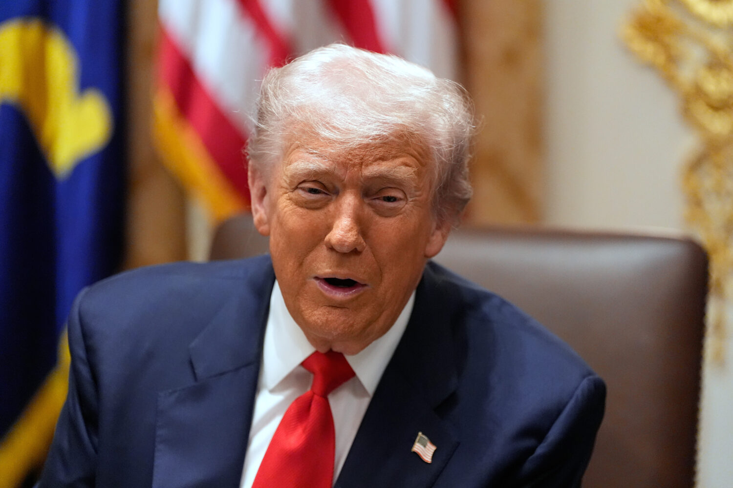 President Donald Trump speaks as he meets with Argentina's President Javier Milei in the Cabinet Ro...