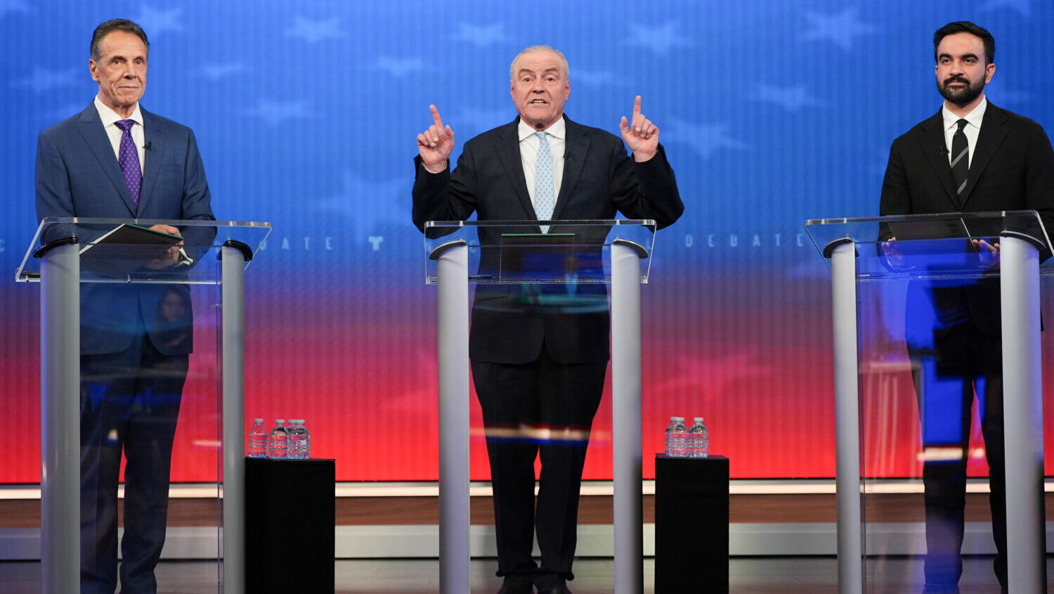 Republican candidate Curtis Sliwa, center, speaks during a mayoral debate with independent candidat...