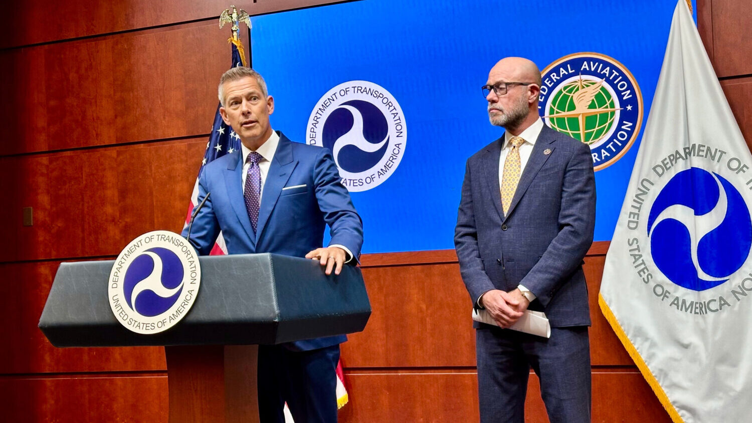 Transportation Secretary Sean Duffy, left, speaks at a news conference with FAA administrator Bryan...