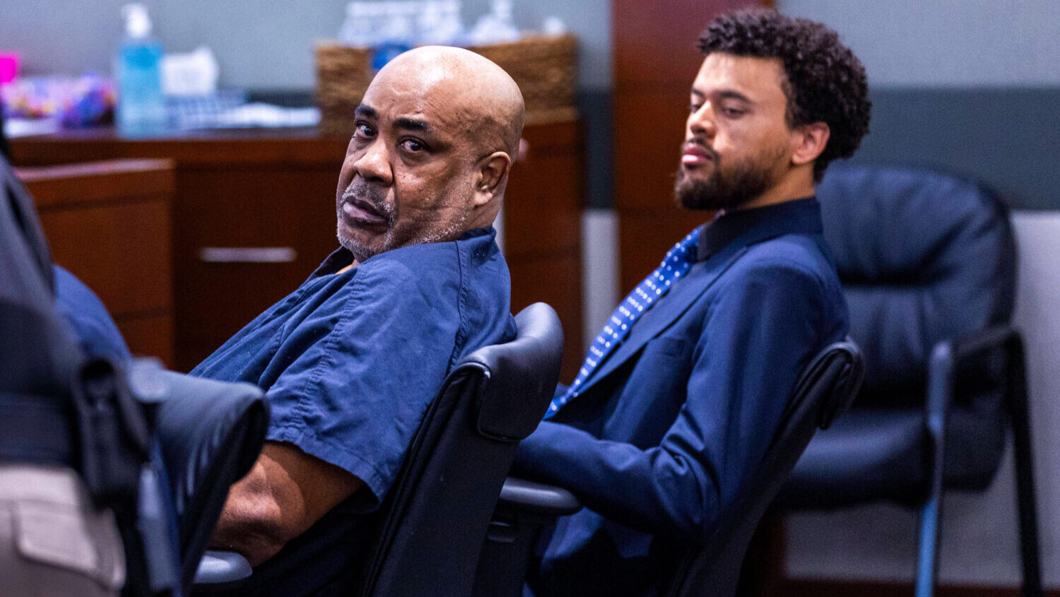 Duane Davis, left, looks back during a hearing on claims of juror misconduct in his jailhouse batte...