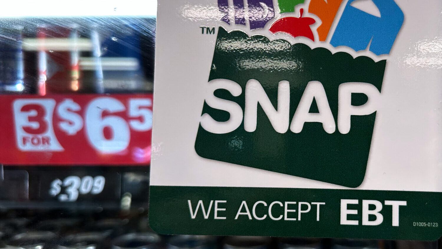 SNAP EBT information sign is displayed at a gas station in Riverwoods, Ill., Saturday, Nov. 1, 2025...