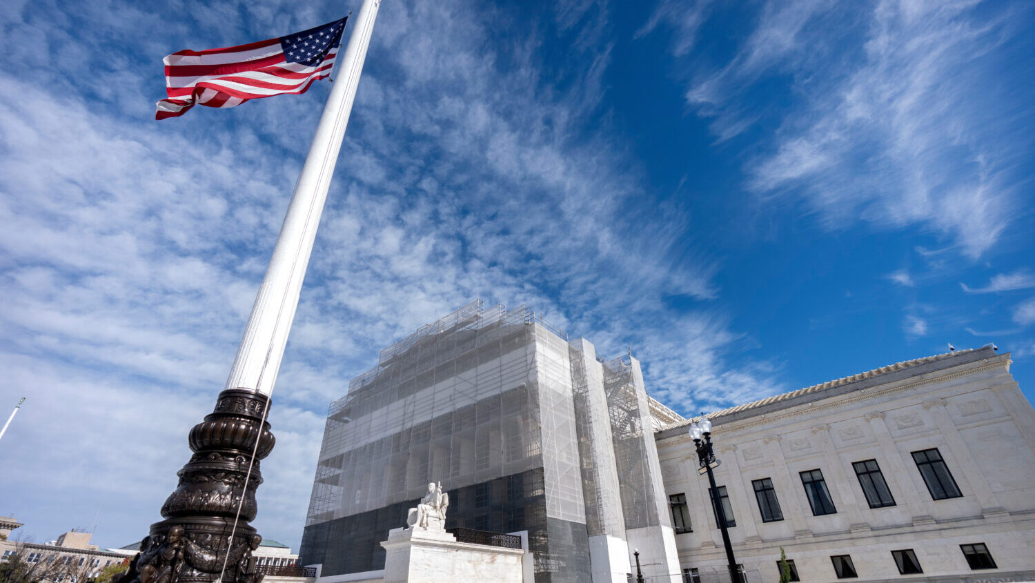 FILE -An American flag flies at half-staff outside the Supreme Court Nov. 5, 2025, in Washington....