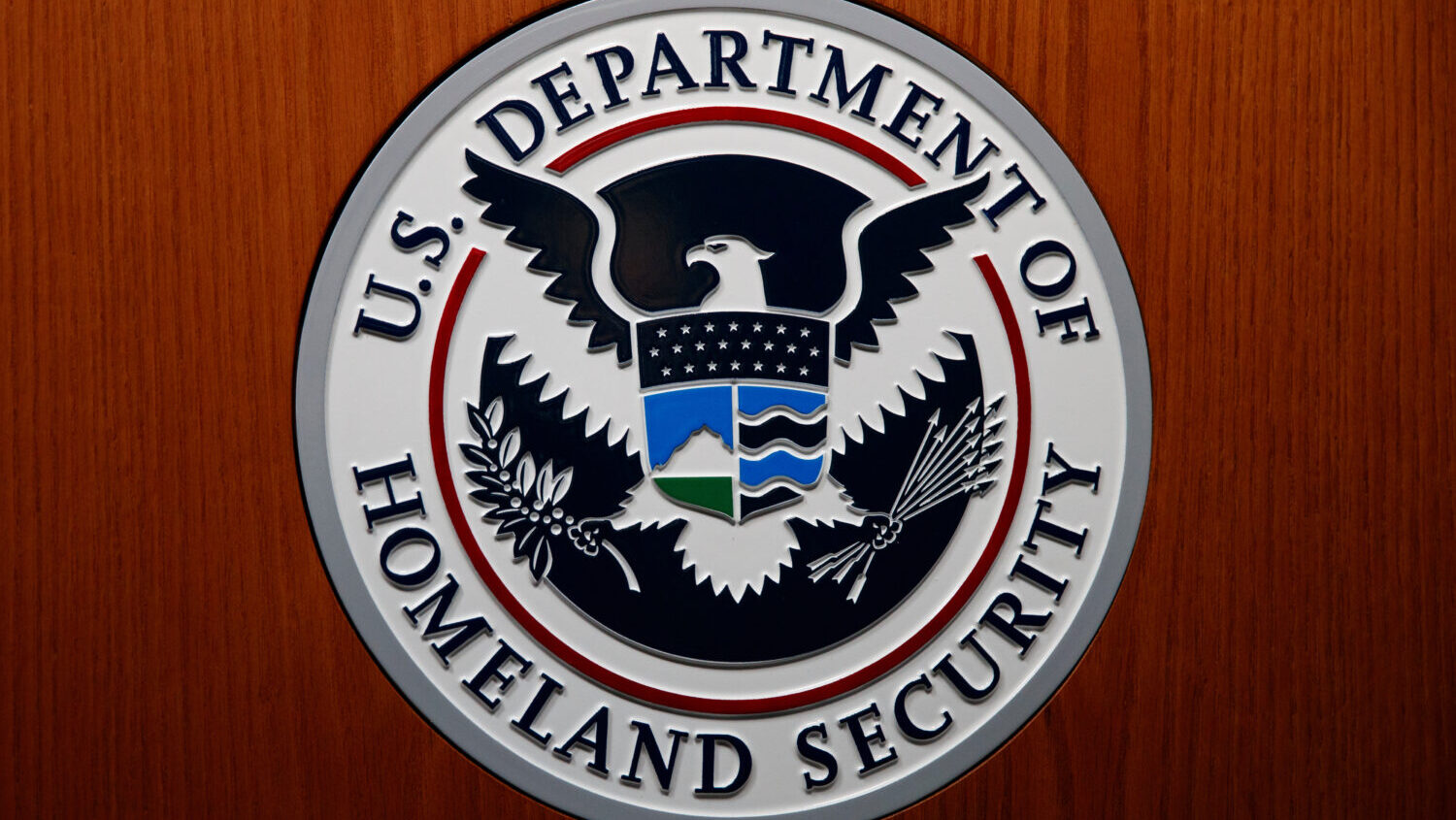 The Department of Homeland Security (DHS) seal during a news conference June 28, 2019, in Washingto...