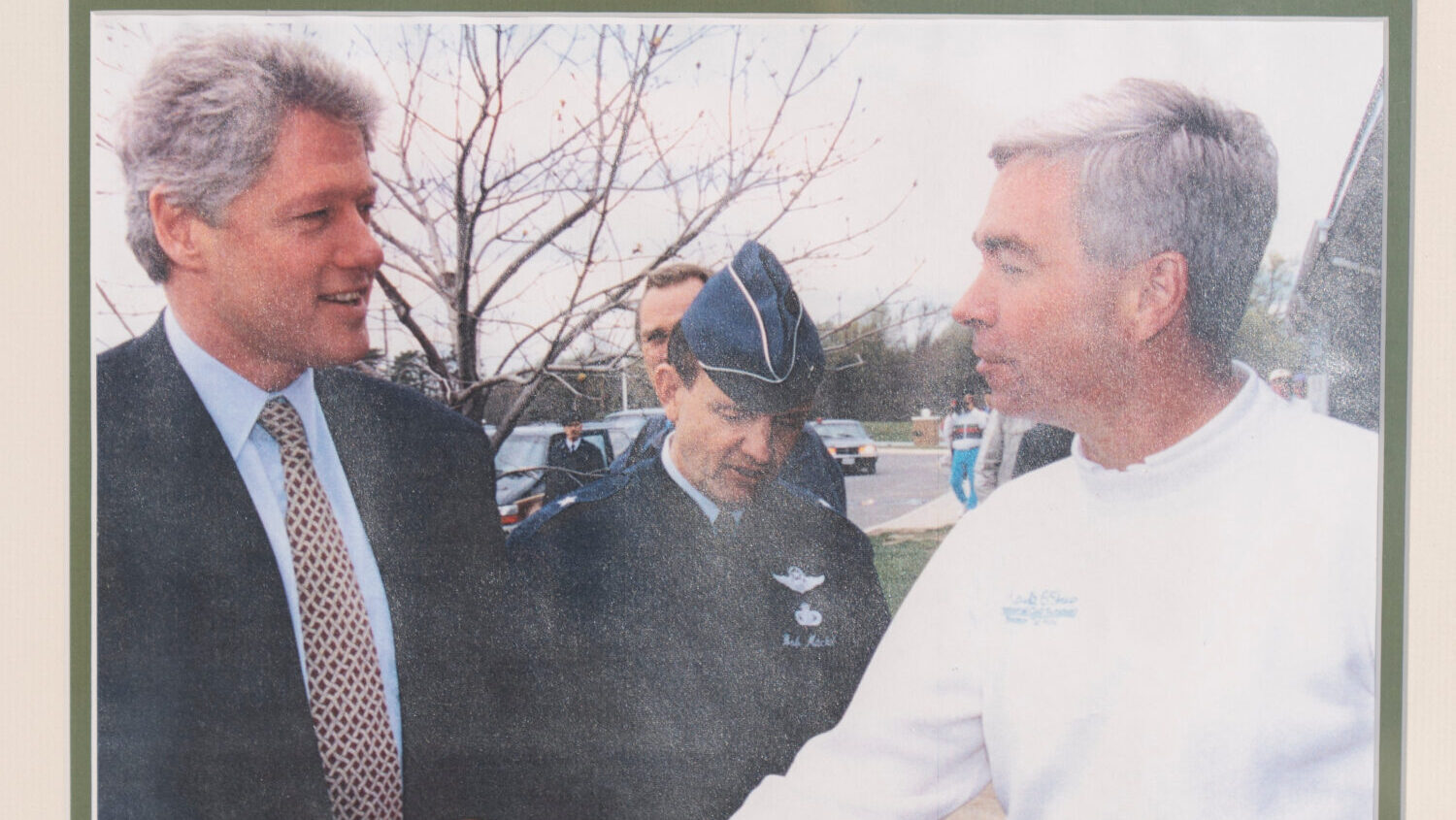 An inscribed photo of President Bill Clinton with Michael Thomas, the former manager of the Courses...