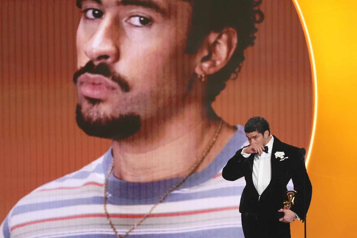 Bad Bunny accepts the award for album of the year for "Debí Tirar Más Fotos" during the 68th annu...
