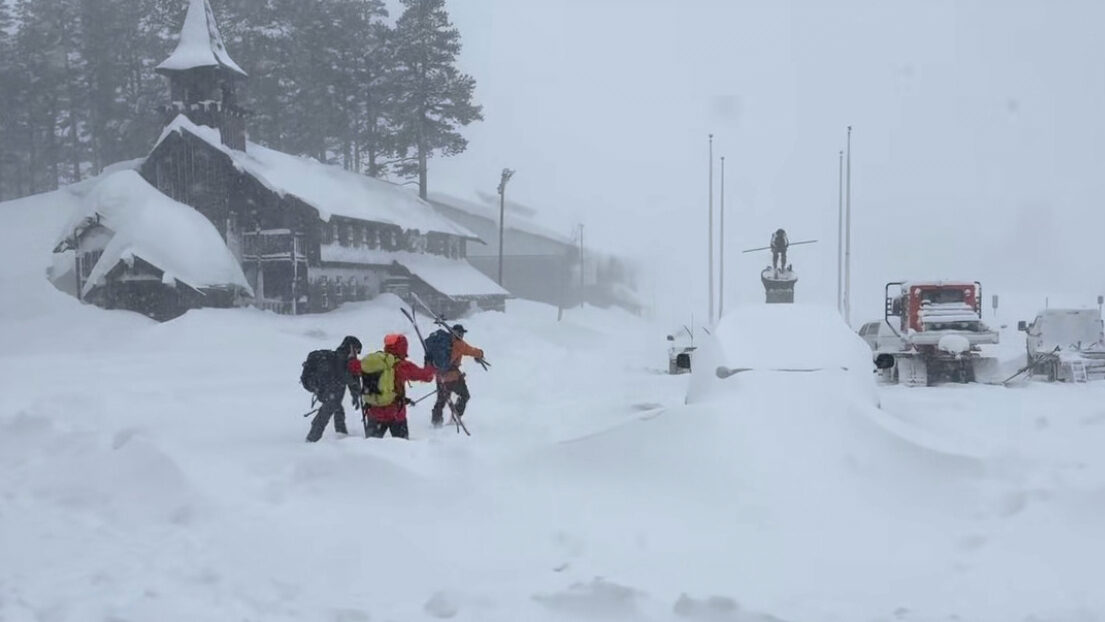 This image provided by the Nevada County Sheriff's Office shows members of a rescue team in Soda Sp...