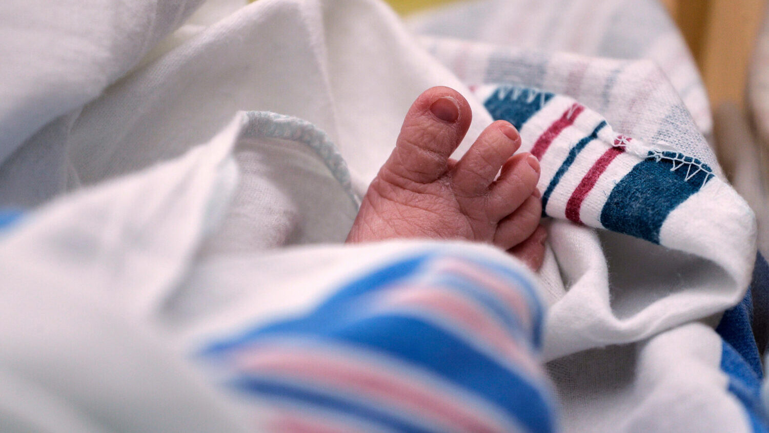 FILE - The toes of a baby are seen at a hospital in McAllen, Texas, on Wednesday, July 29, 2020. U....