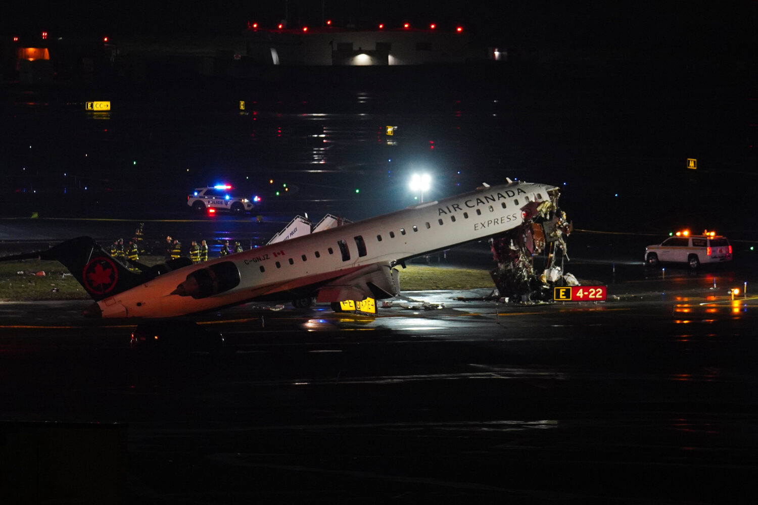 An Air Canada Jet sits on the runway at LaGuardia Airport, Monday, March 23, 2026, after colliding ...