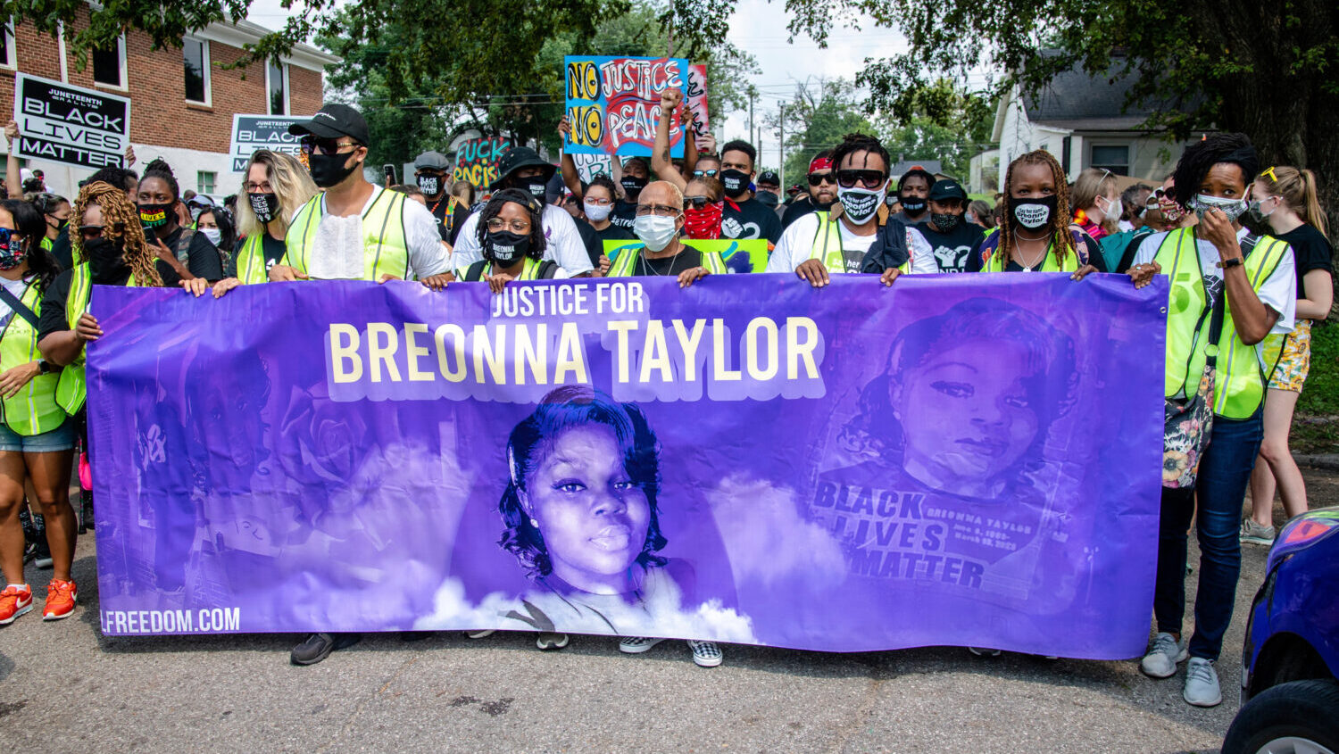 FILE - Protesters participate in the Good Trouble Tuesday march for Breonna Taylor, on Tuesday, Aug...