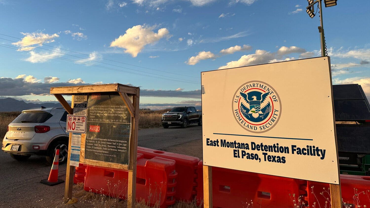 A sign marks the entrance to a series of hardened tents at the Camp East Montana immigrant detentio...