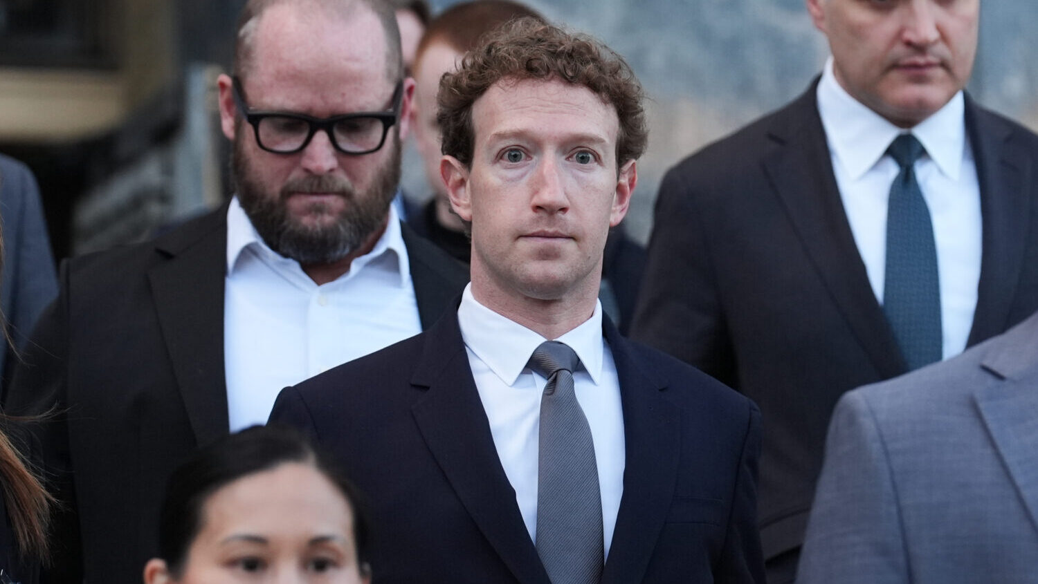 Meta CEO Mark Zuckerberg leaves after testifying in a landmark trial over whether social media plat...