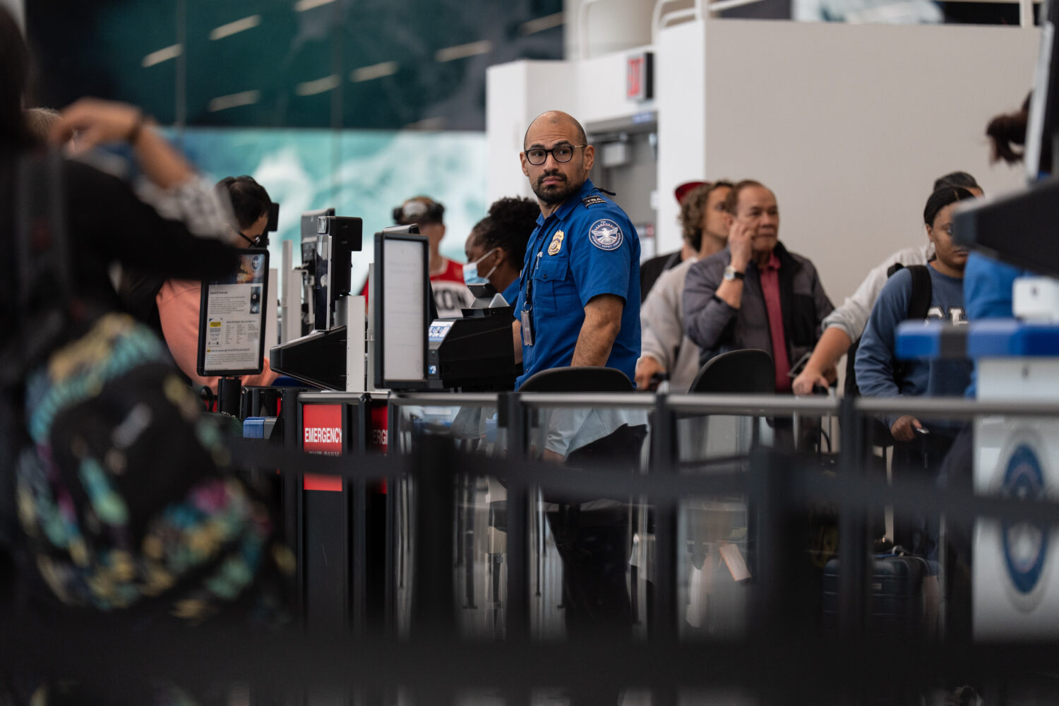 A TSA agent works at Los Angeles International Airport in Los Angeles, Friday, March 27, 2026. (Jae...