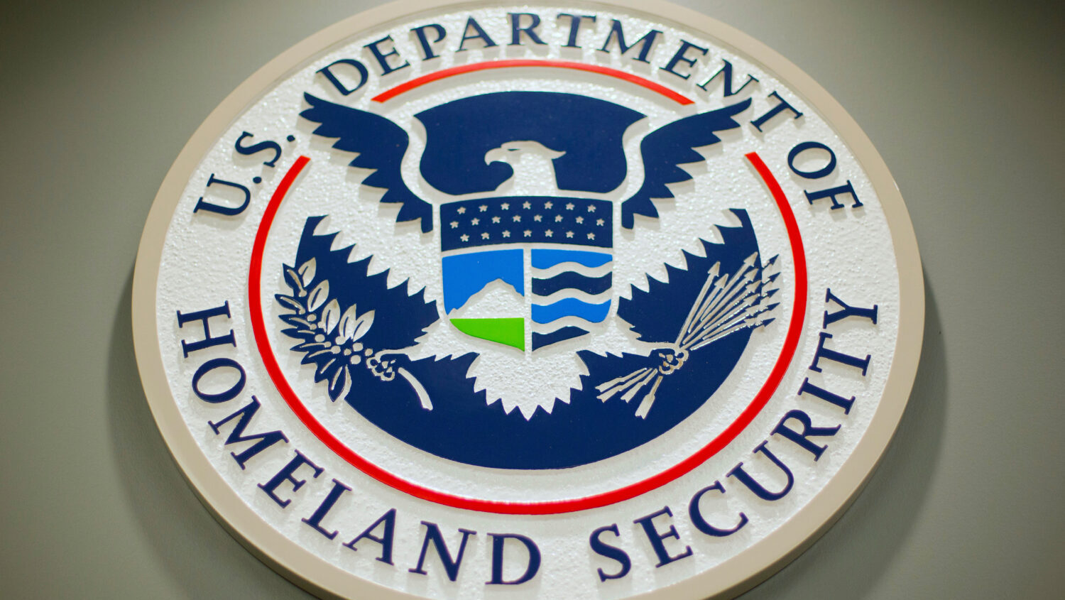 FILE - The Department of Homeland Security logo during a news conference in Washington, Feb. 25, 20...