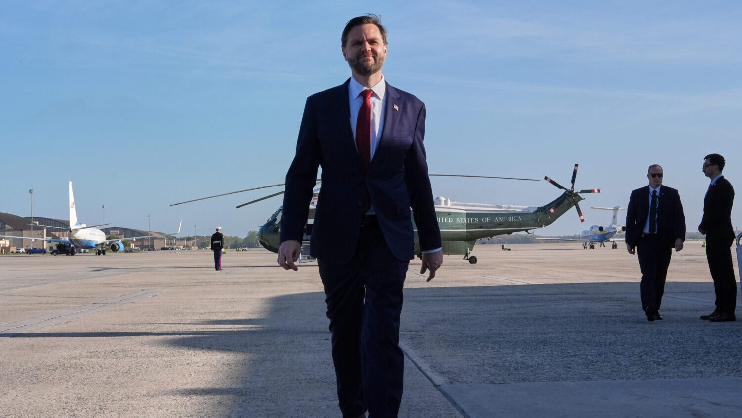Vice President JD Vance walks to speak with the Press before boarding Air Force Two, Friday, April ...