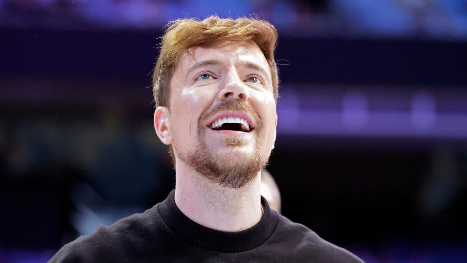 FILE - YouTube personality MrBeast, aka Jimmy Donaldson, watches a contestant's shot in a free thro...