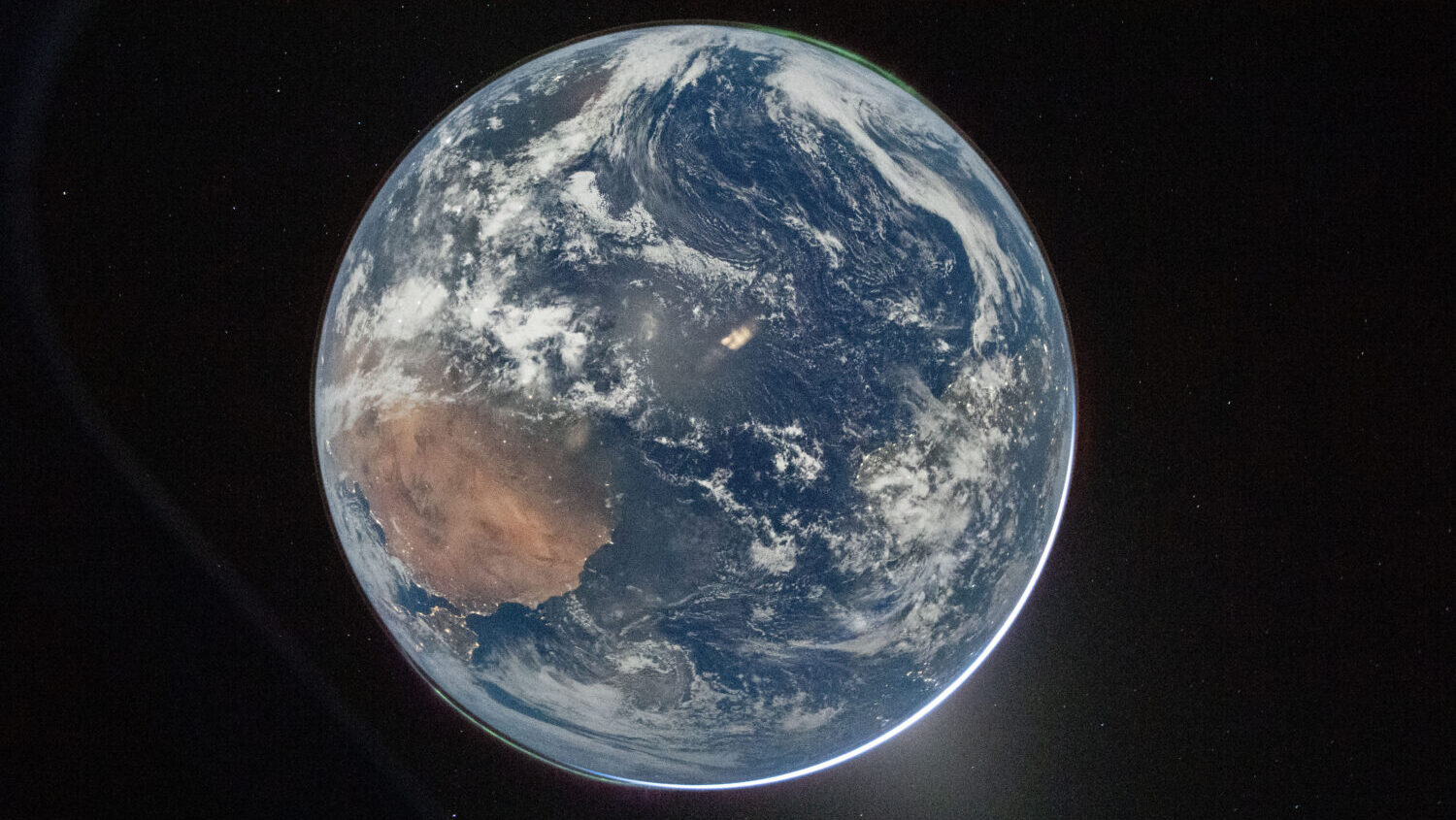 This image provided by NASA shows a view of Earth taken by NASA astronaut and Artemis II Commander ...