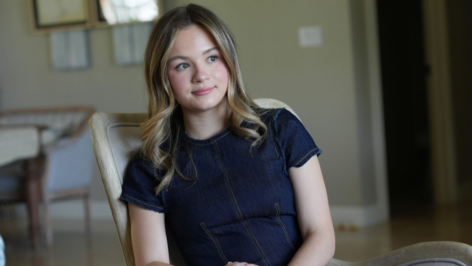 Lauryn Muller sits at her home Monday, April 13, 2026, in Coral Springs, Fla....