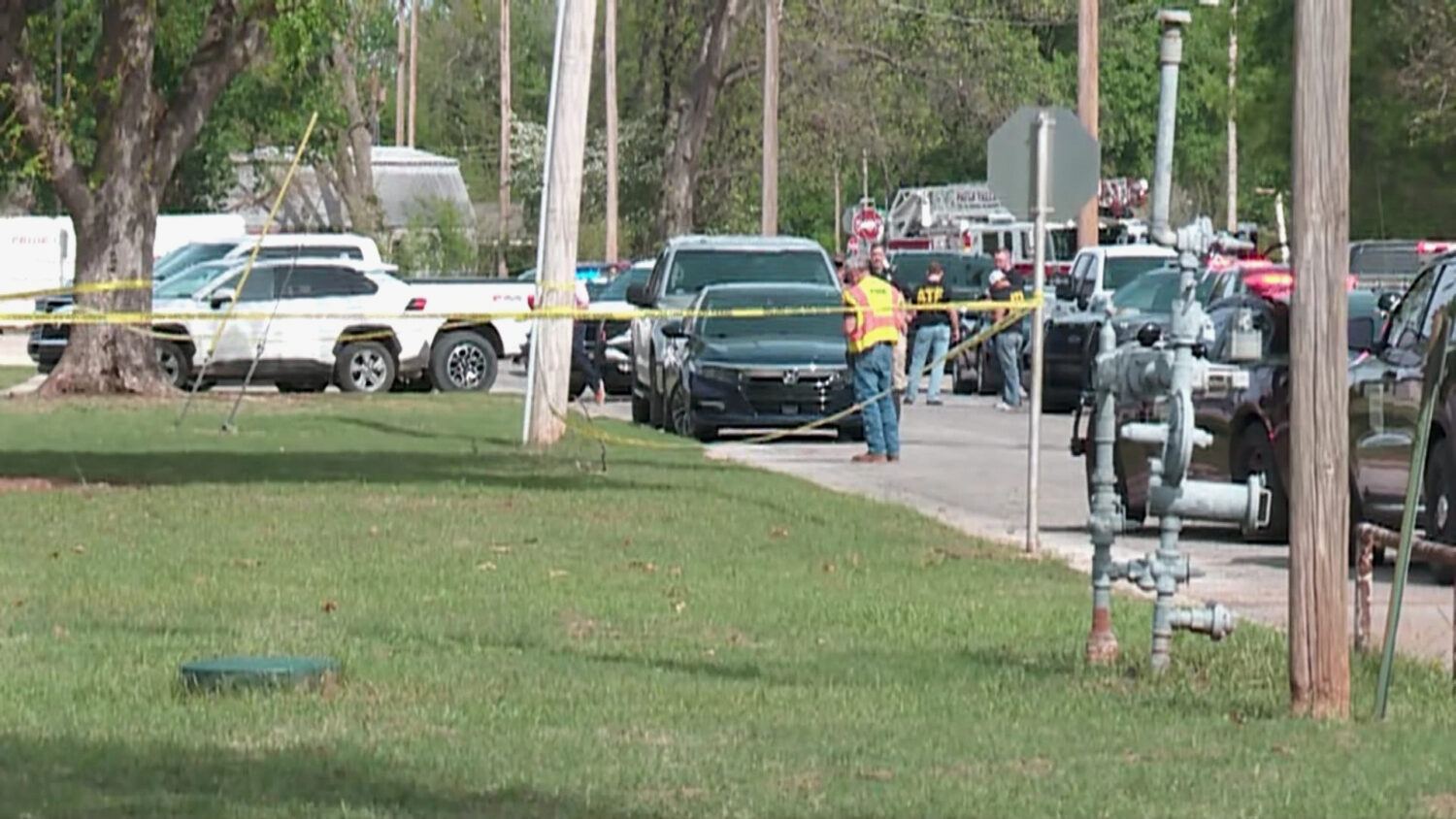 In this image taken from video provided by Oklahoma television station KFOR, authorities block off ...