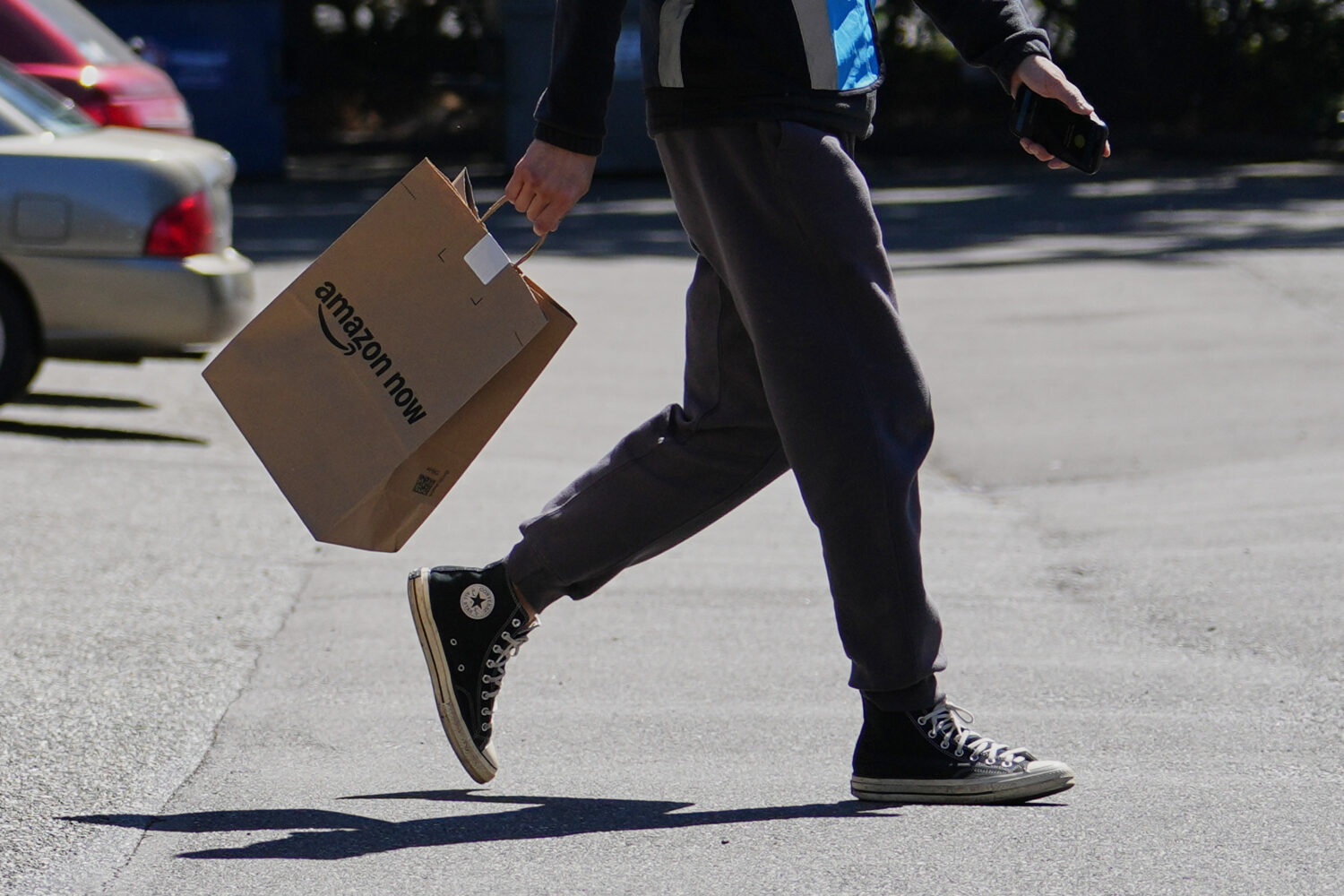 A driver picks up an order at an Amazon Now location, Monday, May 11, 2026, in Bellevue, Wash. (Lin...