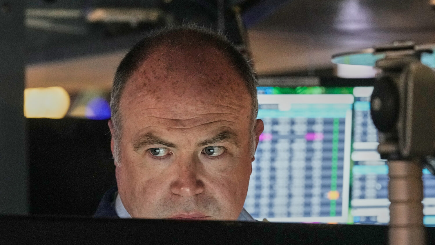 Trader Derek Orth works on the floor of the New York Stock Exchange, Thursday, April 30, 2026....