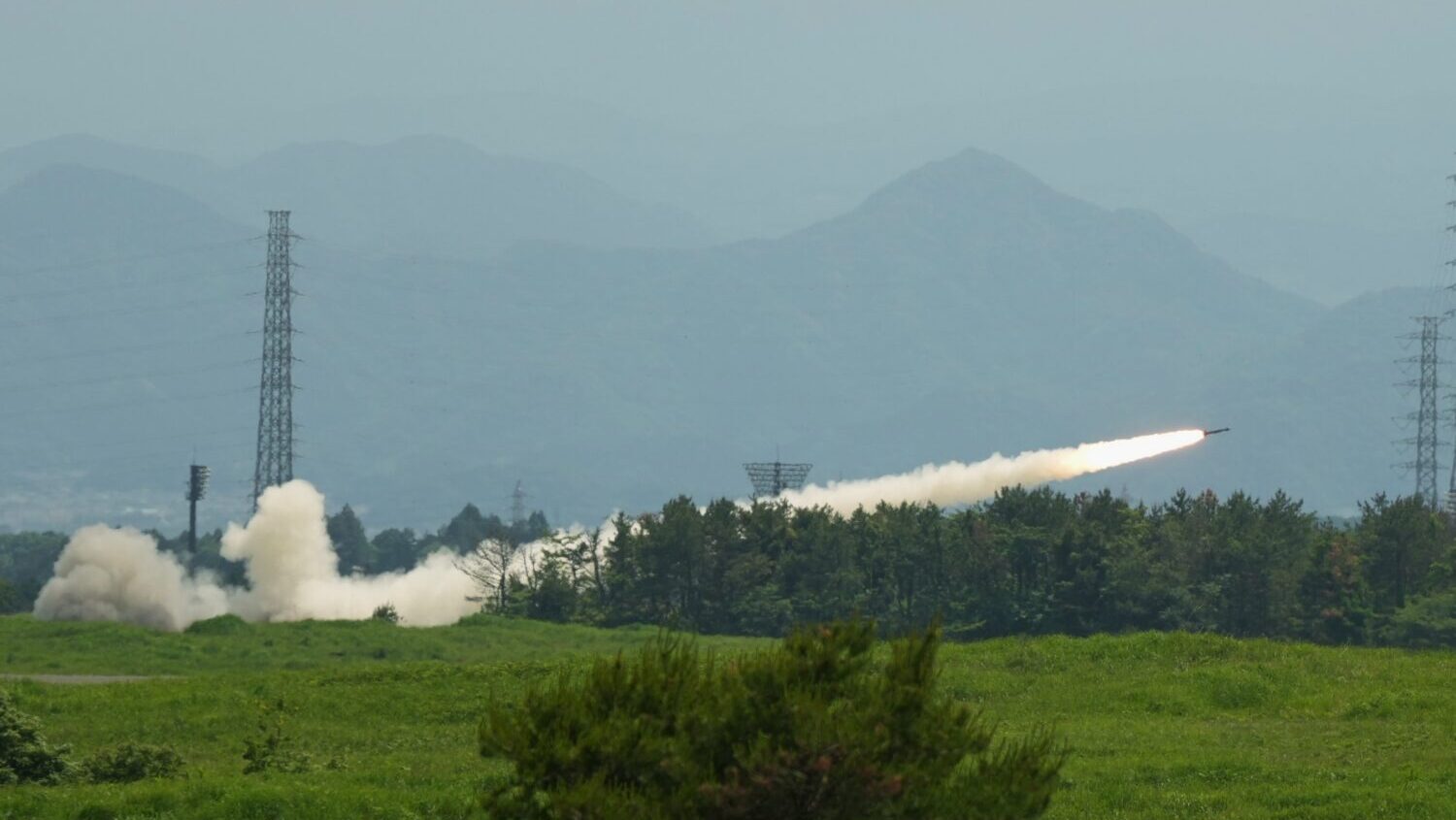 U.S. Marines conduct a live-fire training of the High Mobility Artillery Rocket System, short for H...