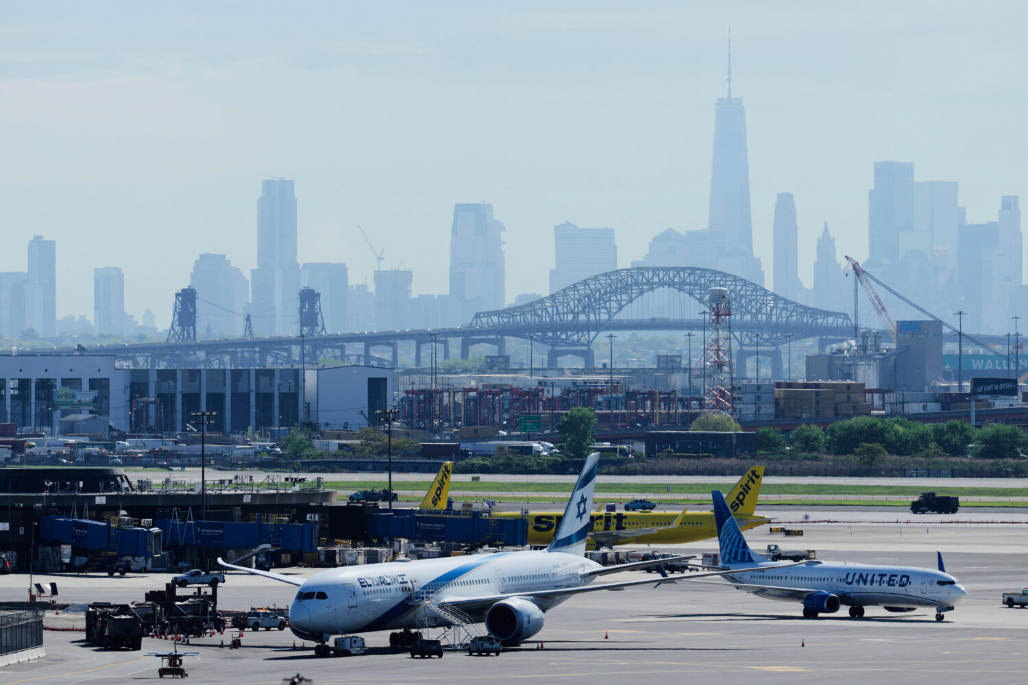 FILE - The New York City skyline is seen behind Newark Liberty International Airport in Newark, N.J...