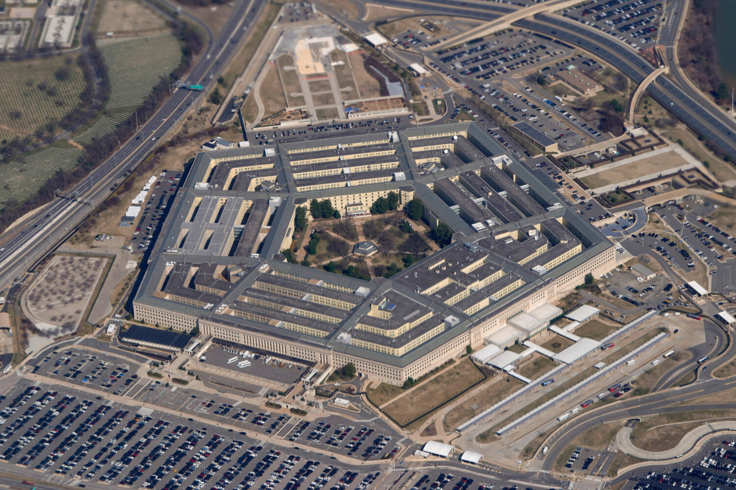 The Pentagon is seen from Air Force One as it flies over Washington, March 2, 2022....