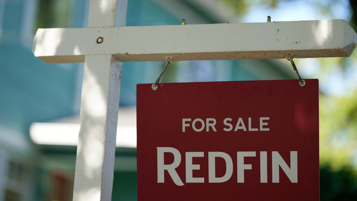 FILE - A "For Sale" sign is displayed outside a home on Friday, July 11, 2025, in Portland, Ore....